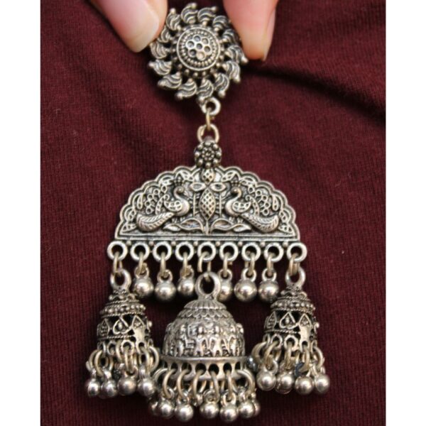 Silver and plated Peacock embellished triple jhumkis with dongri style to finish your look