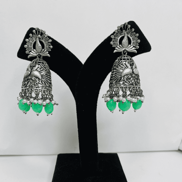 Silver amazingly designed jhumkiwith green beads