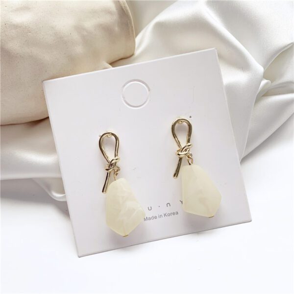 White stone earrings