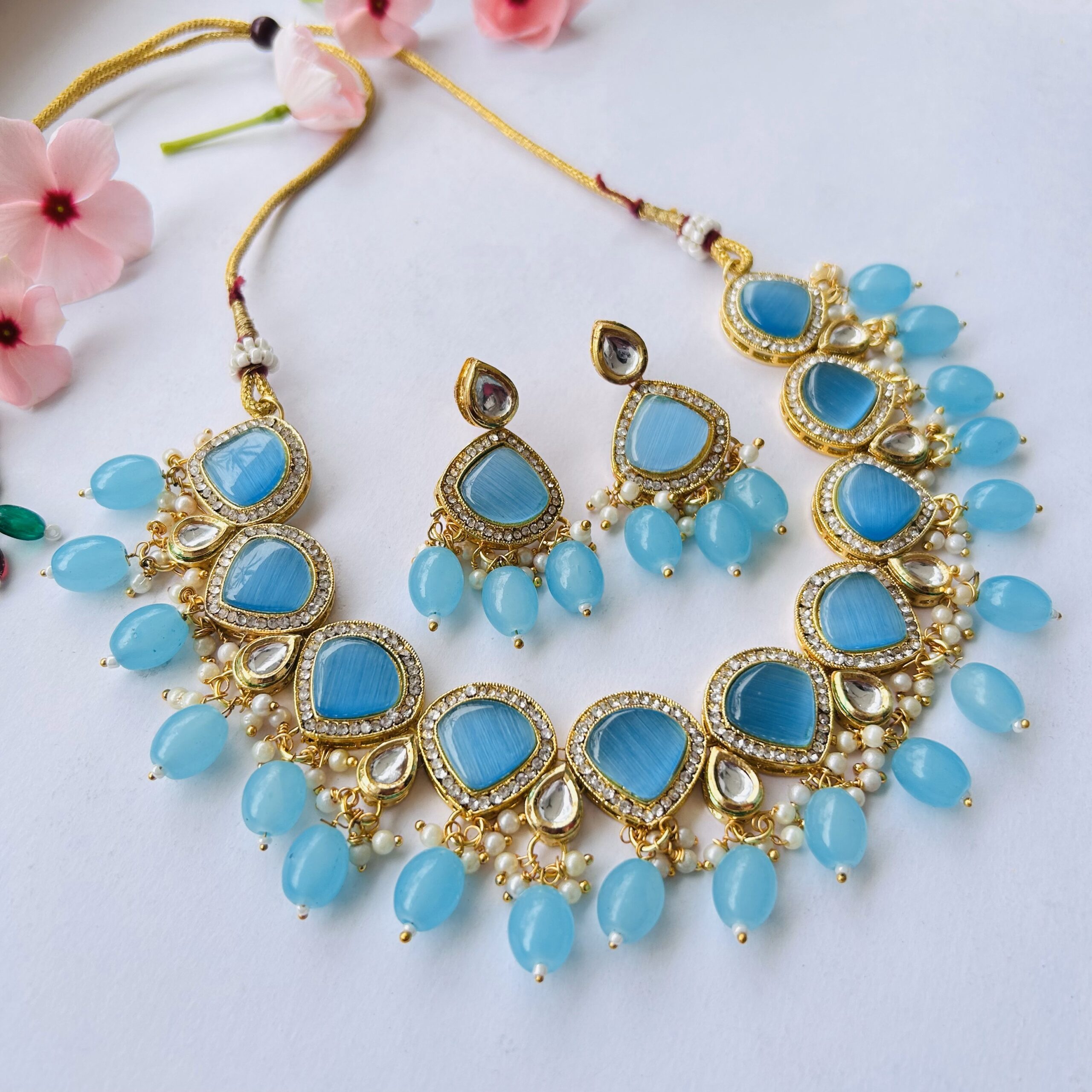Buy Atasi International Gold Plated Crystal Necklace White and Blue stone  Leaf Design Jewellery Set with Earrings Suited for Party Wedding Festive  for Women Girls at Amazon.in