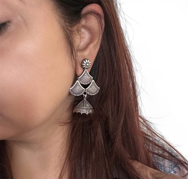 Oxidised Jhumka Earrings for Girls with intricate detailing and a traditional oxidised silver finish, perfect for festive or casual wear.