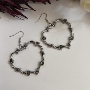 Thorn Heart Wired Hoop Earrings with intricate detailing and an oxidised finish, featuring a bold, unique design.