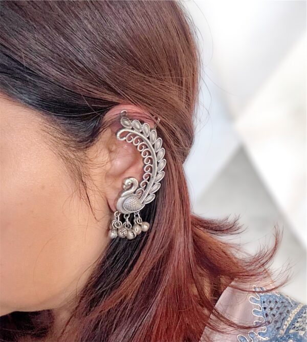 Peacock Style Oxidised Ear Cuff Earrings with intricate peacock design and detailed craftsmanship.