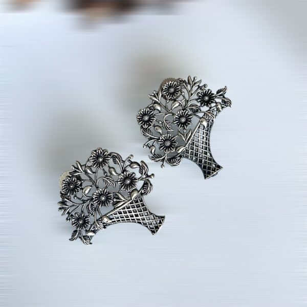 Stylish floral oxidised earrings for women and girls with intricate floral patterns, perfect for traditional and modern outfits.