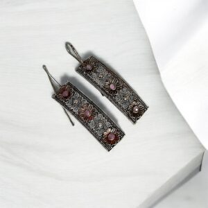 Oxidised hooks earrings with intricate craftsmanship, designed for an ethnic and traditional look.