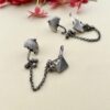 oxidised ear cuff with chain and flower design