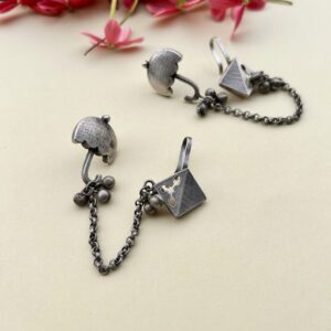 oxidised ear cuff with chain and flower design